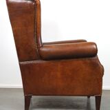 Especially comfortable wingback chair made of sheepskin leather, stunning colors