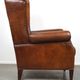 Especially comfortable wingback chair made of sheepskin leather, stunning colors