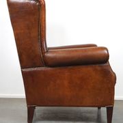 Fauteuil à oreilles particulièrement confortable en cuir de mouton, couleurs époustouflantes