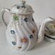 coffee pot, cup and saucers