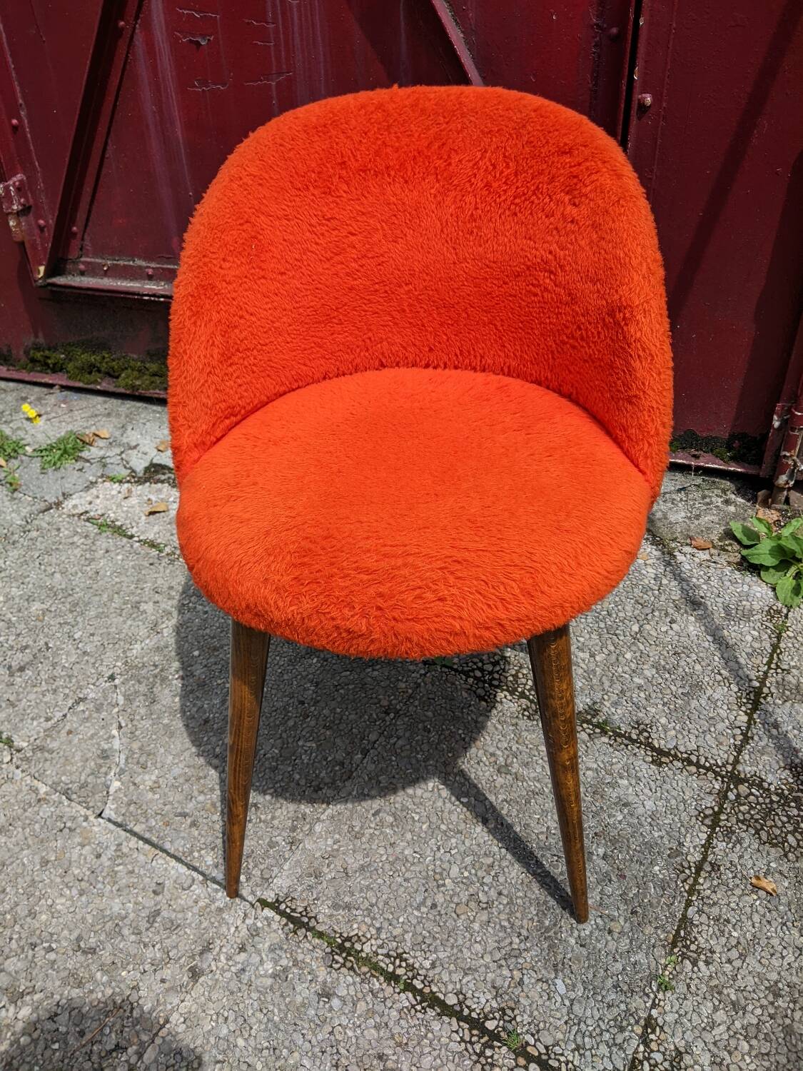 Orange furry barrel chair