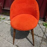 Orange furry barrel chair