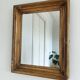 Antique giltwood wall mirror in gold