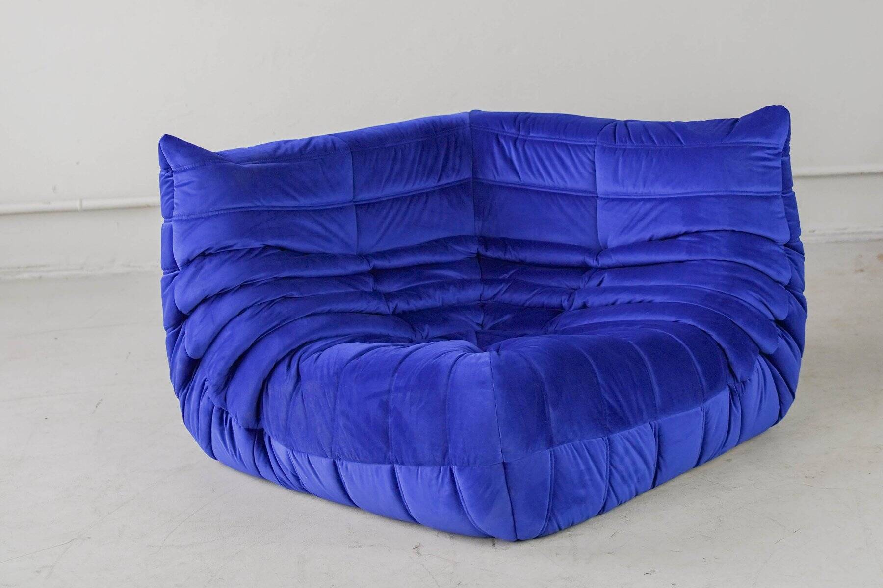 Togo corner chair in blue velvet by Michel Ducaroy for Ligne Roset