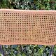 Wooden chair with caning in the style of Marcel Breuer.