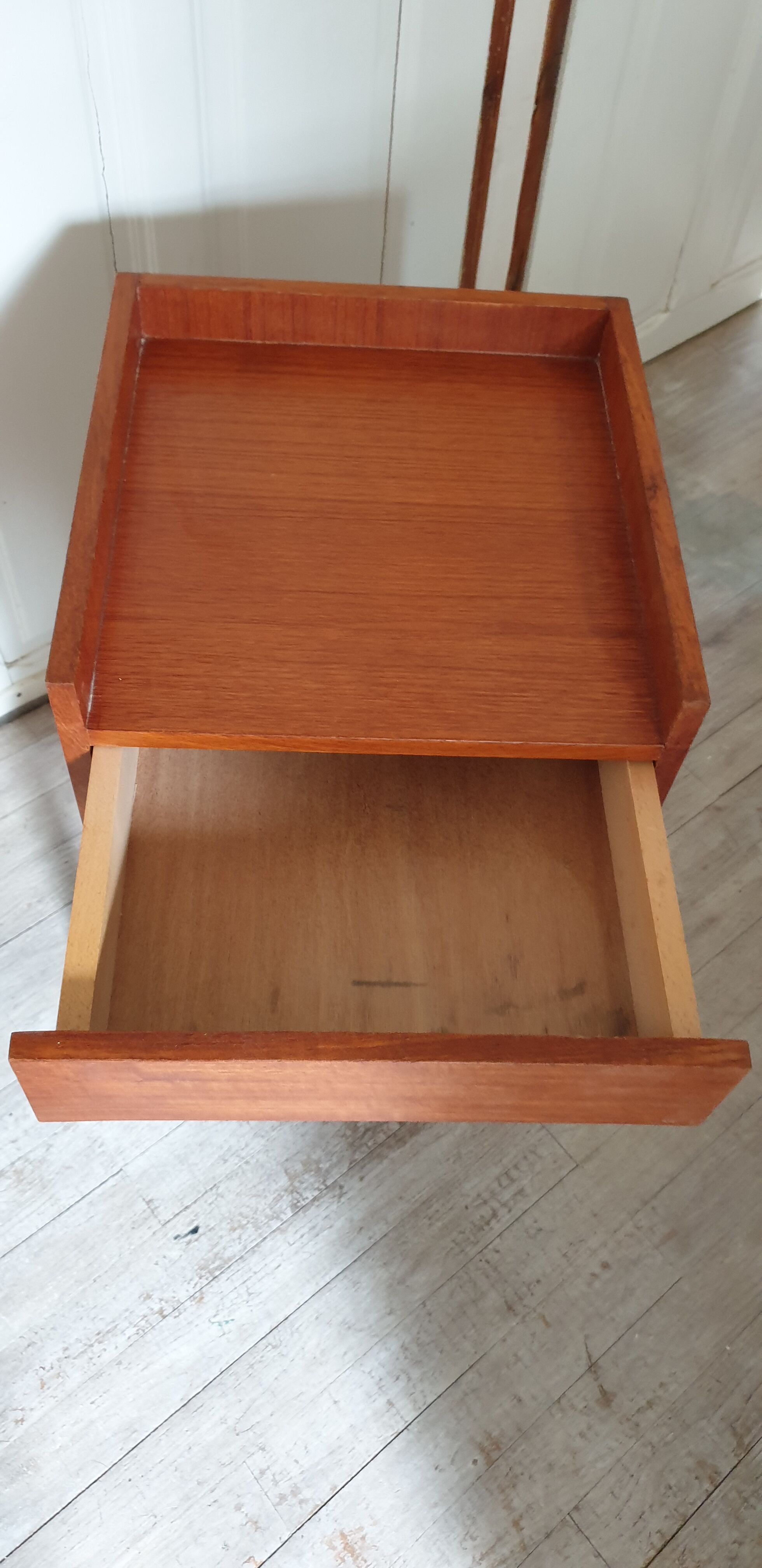 Scandinavian-style compass-footed bedside