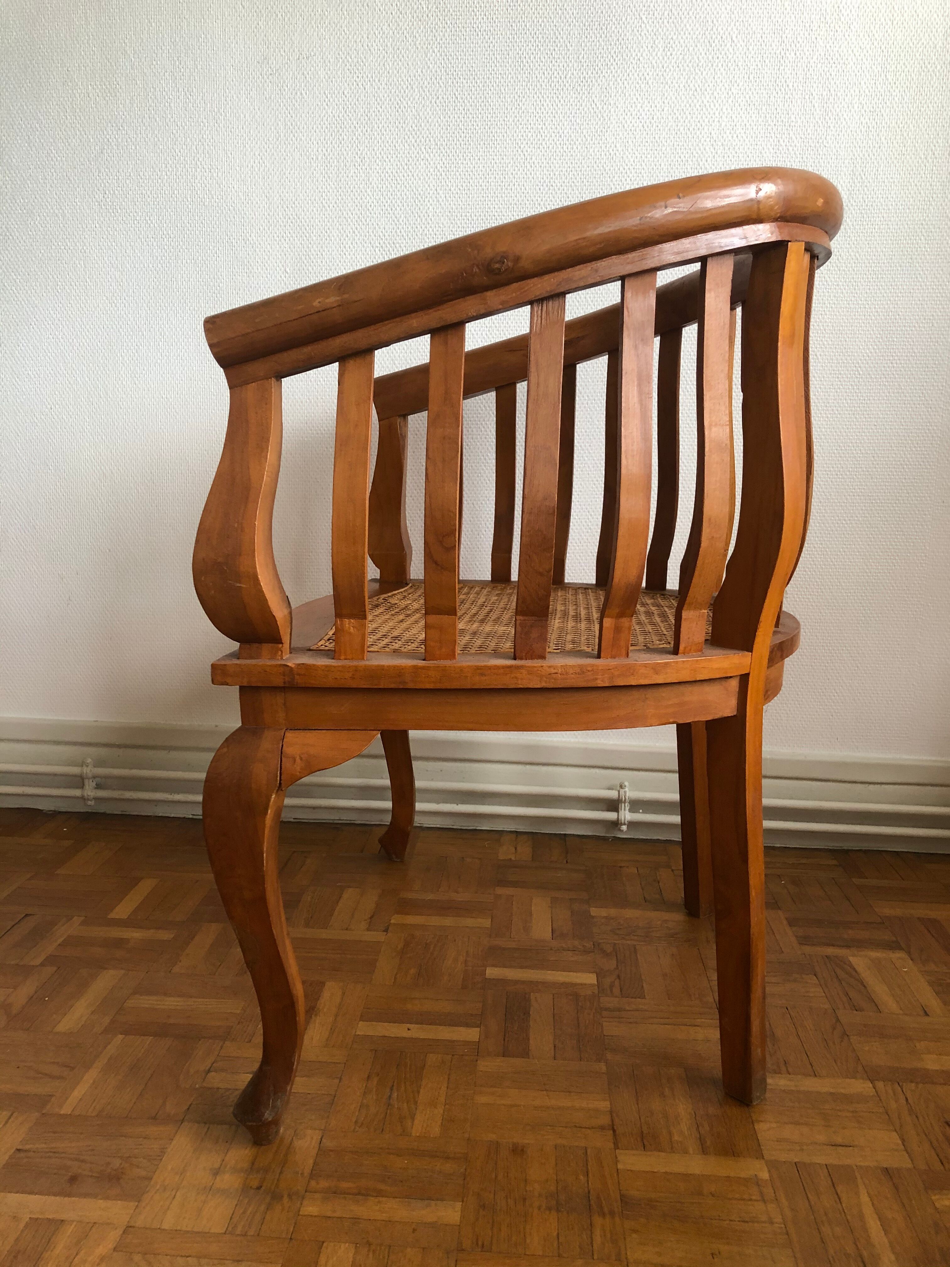 Exotic wooden canne colonial armchair