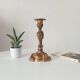 Antique 19th-century solid gilded bronze candlestick in the Louis XV style.