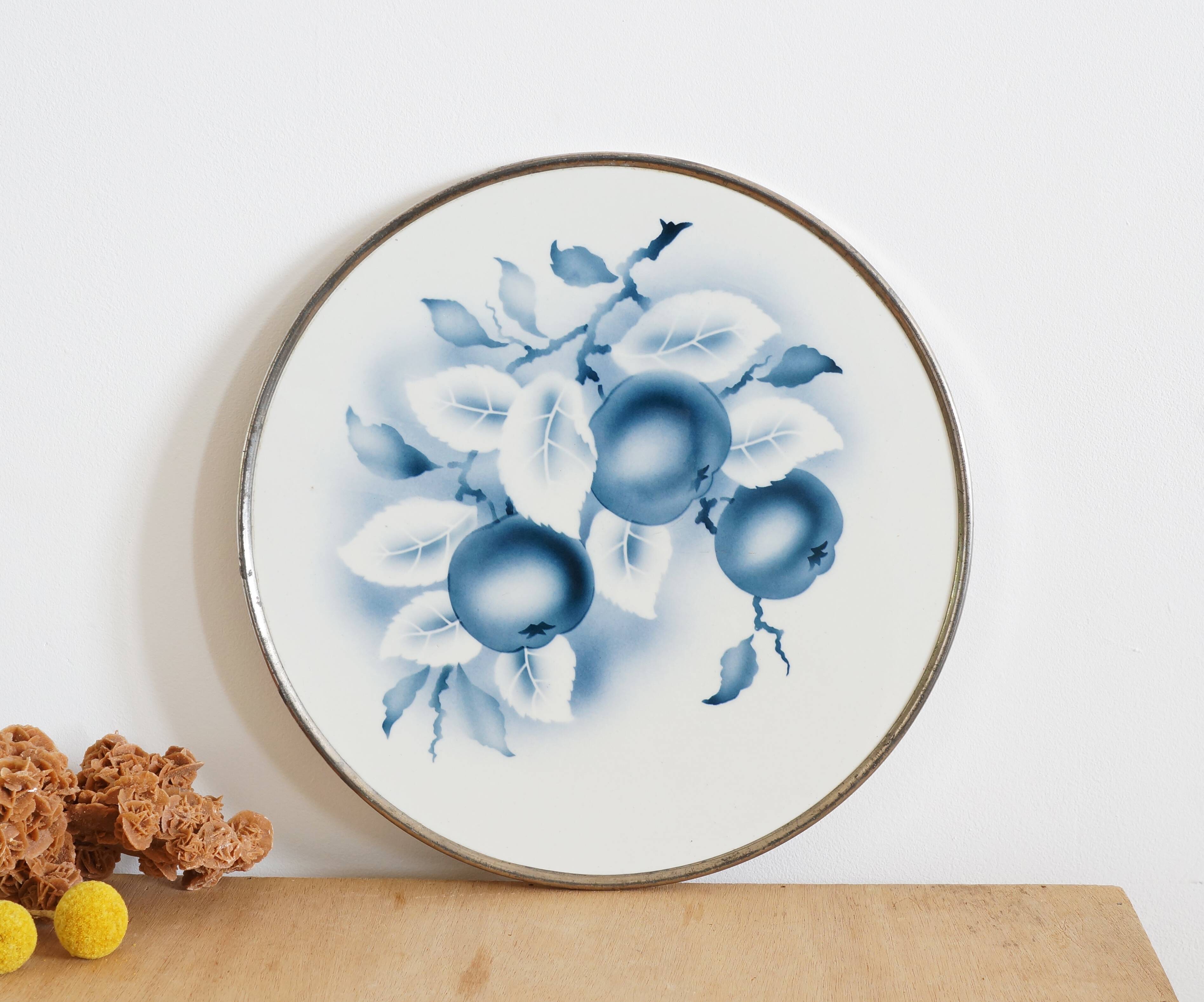 Round earthenware and metal trivets in the 30s or 40s