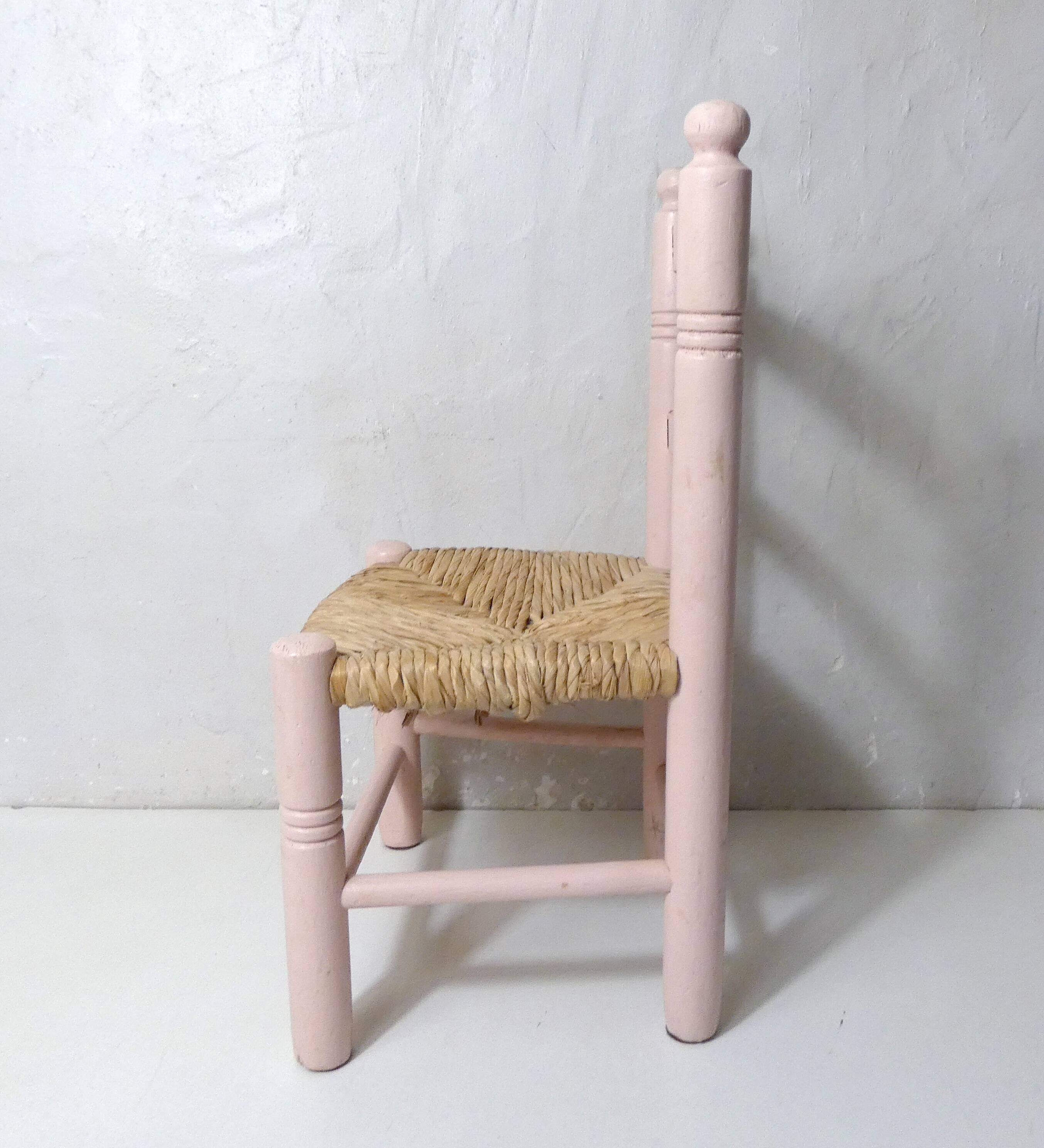 Old wooden straw chair for children
