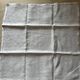 Set of six antique damask napkins with embroidered monogram.