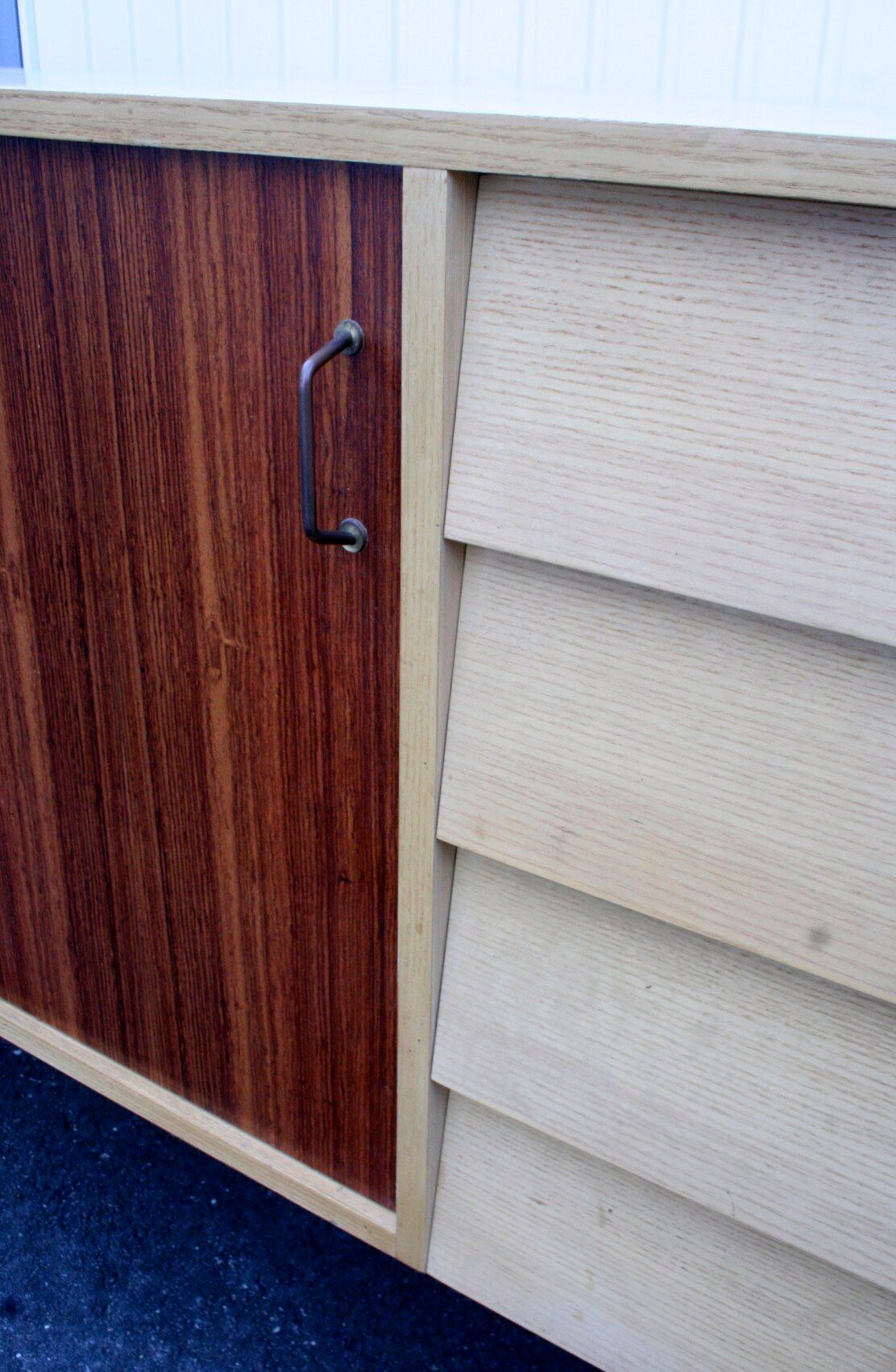 Midcentury sideboard with brass legs