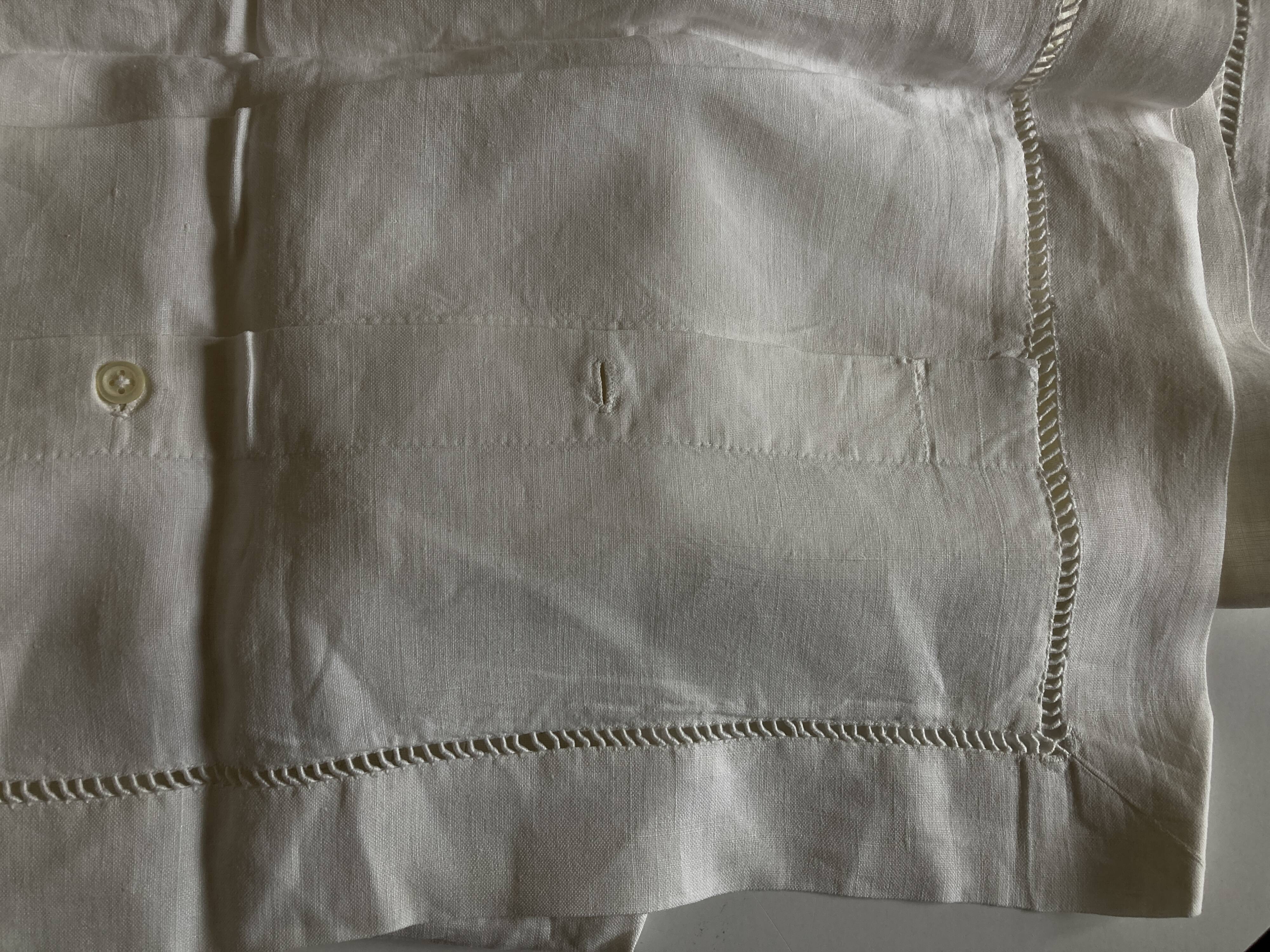 Pair of modernist linen pillowcases embroidered with comic strips