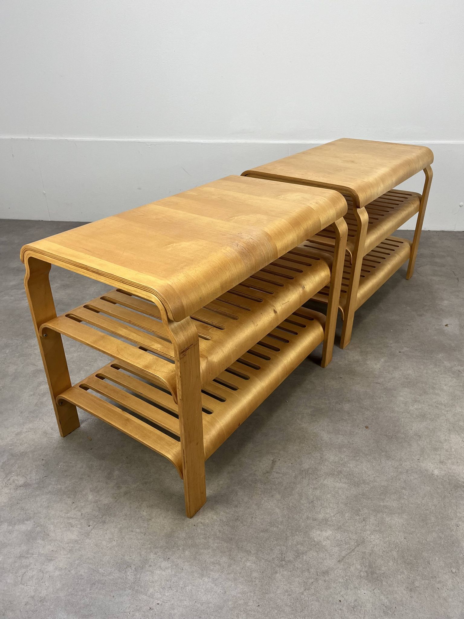 Pair of curved wooden entrance benches 1980