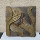 Bas relief en pierre style Art Déco, femme cheveux au vent