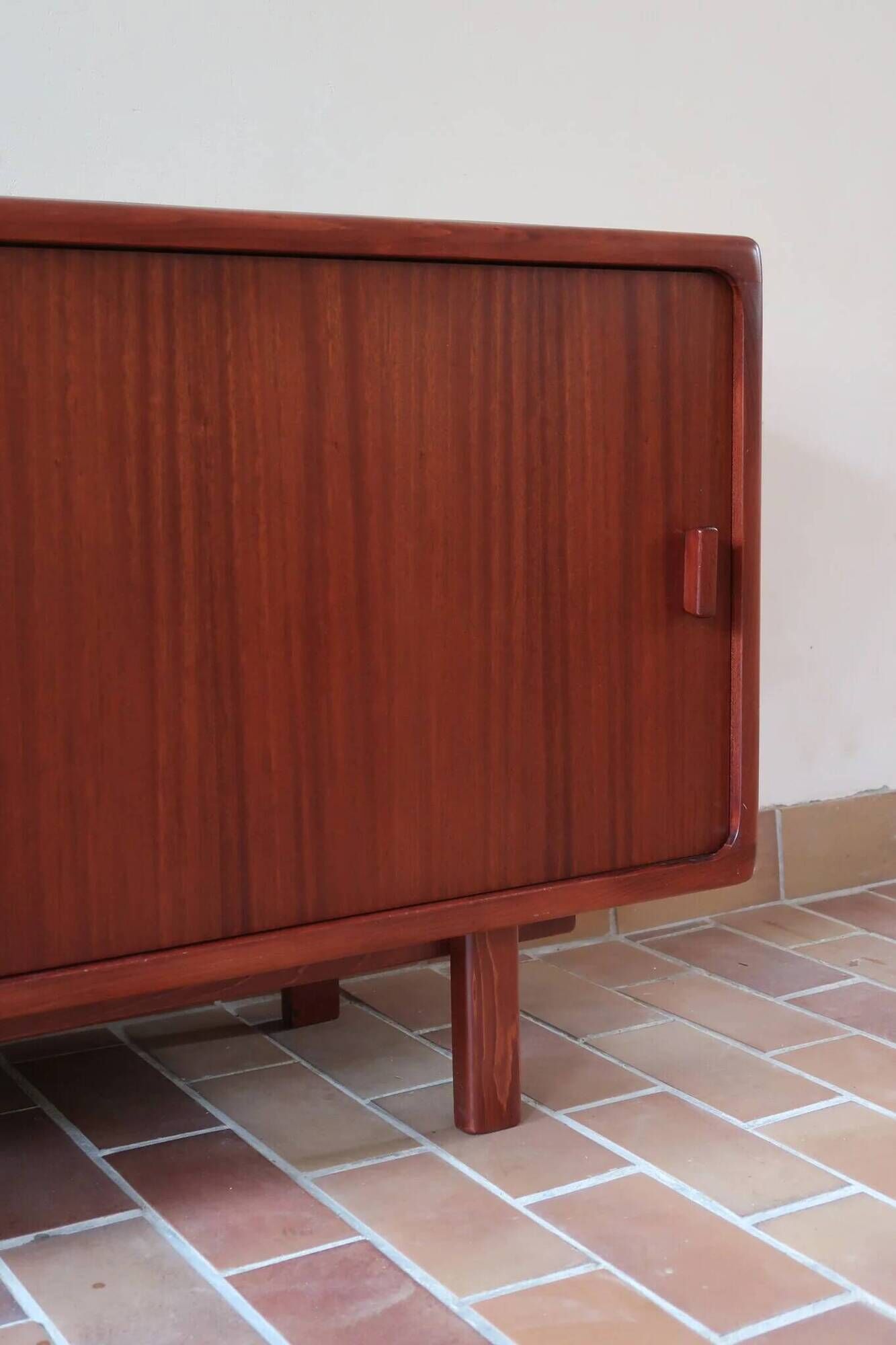 Teak enfilade, sliding doors, black faux leather top, 1970s.
