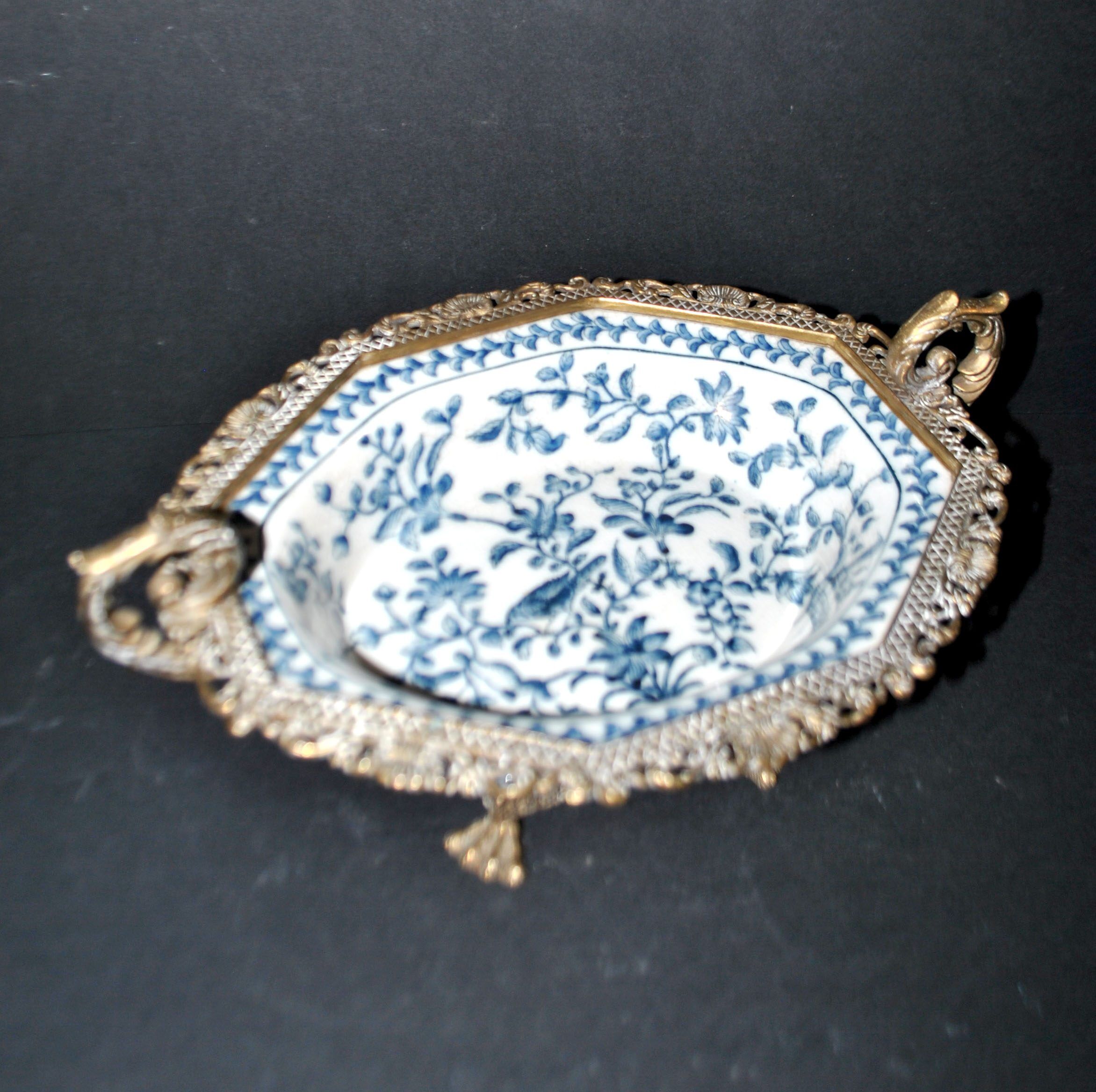 Blue Chinese floral porcelain coupe on a bronze base table centrepiece.