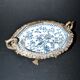 Blue Chinese floral porcelain coupe on a bronze base table centrepiece.