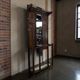 Vintage wooden coat rack with mirror.