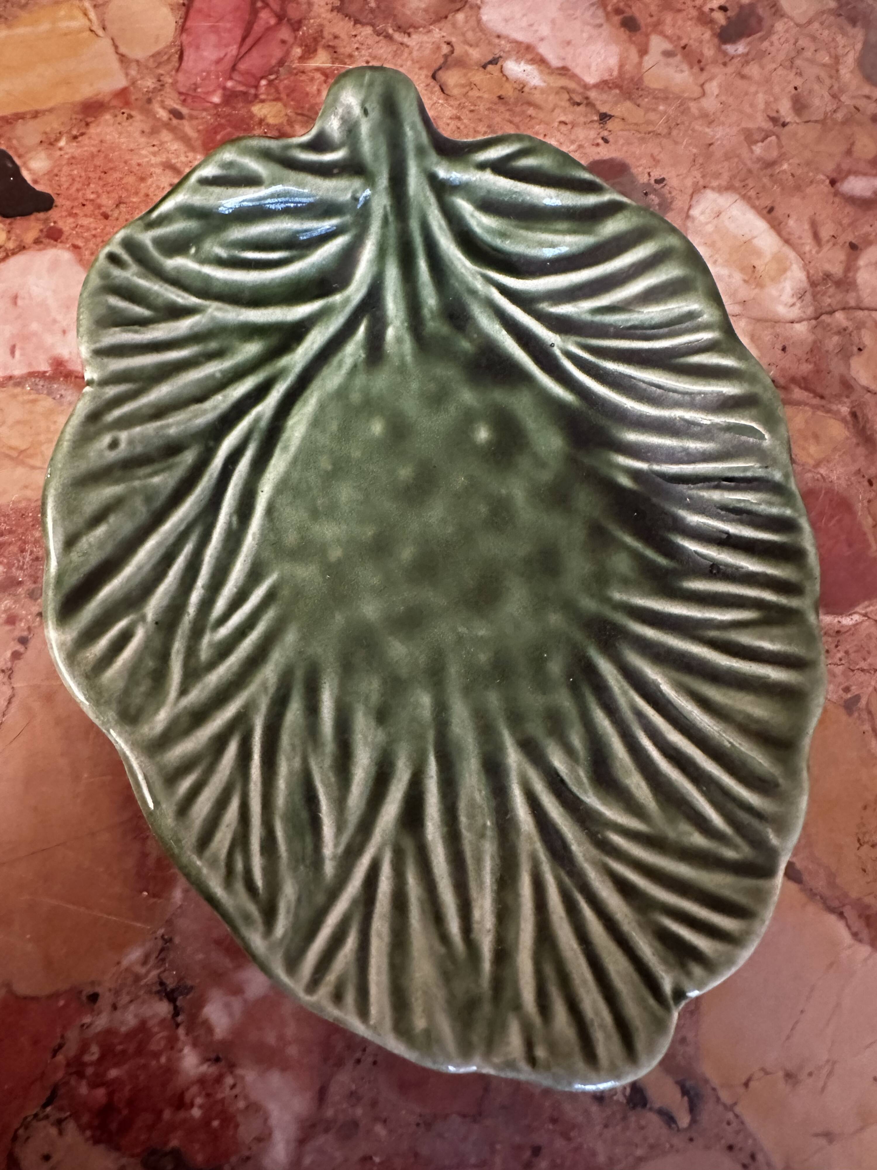 Vintage leaf-shaped green majolica catchall.