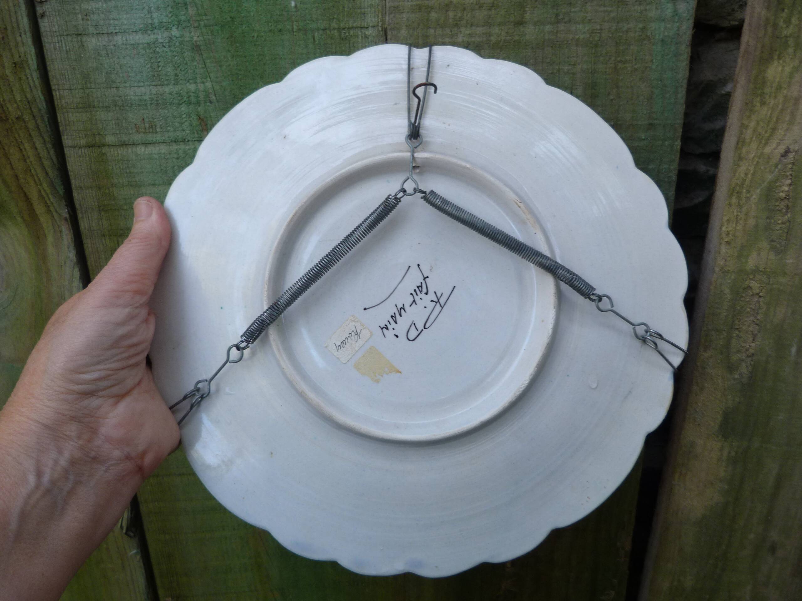 Old Gien earthenware scalloped plate with blue/yellow flower basket motifs