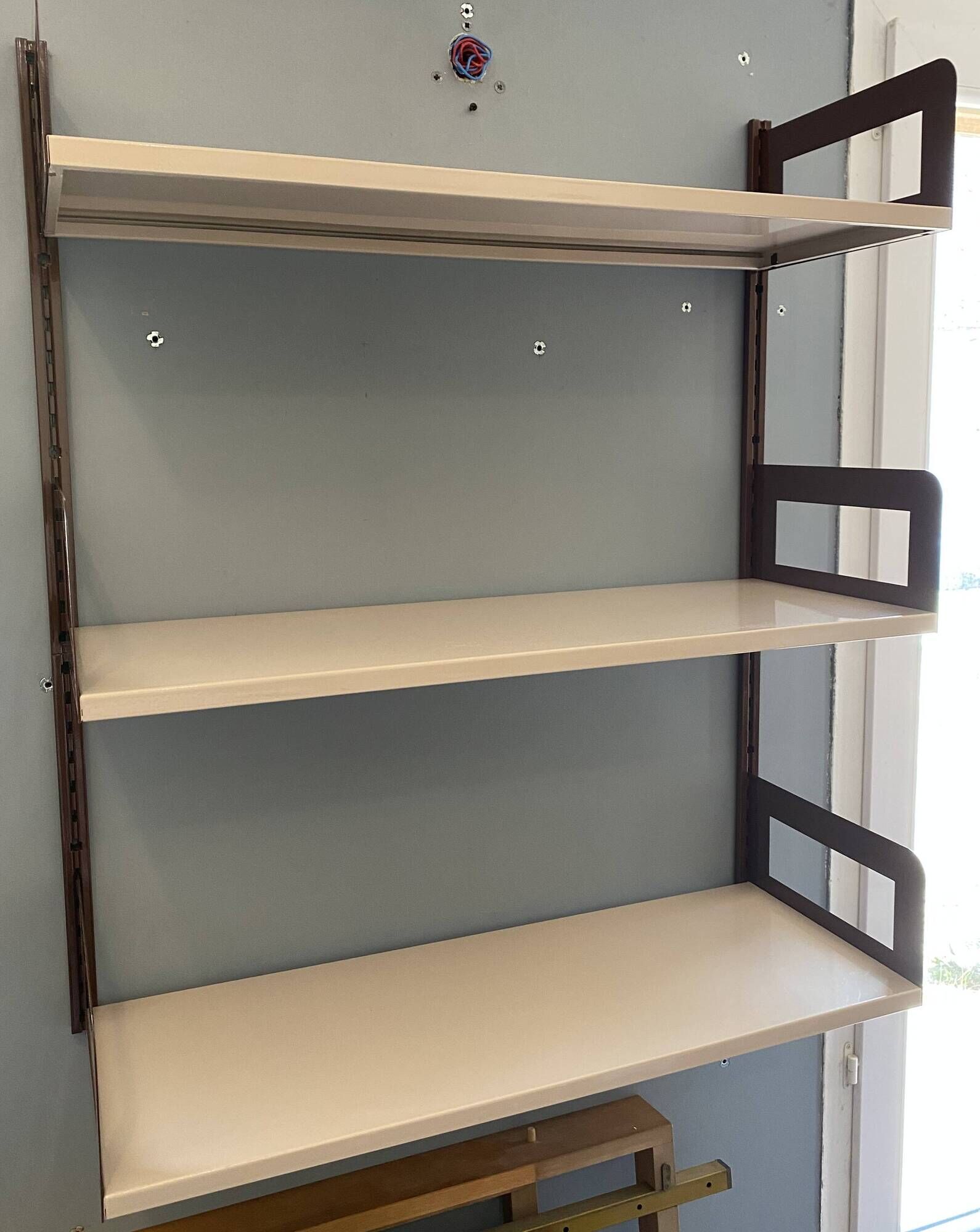 Modular metal wall shelf in brown and beige vintage 70s design.