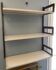 Modular metal wall shelf in brown and beige vintage 70s design.
