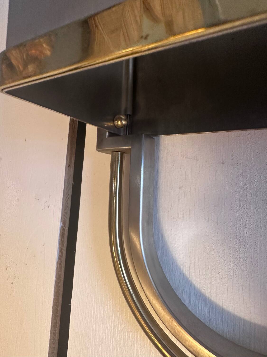 Pair of stainless steel and brass wall lights