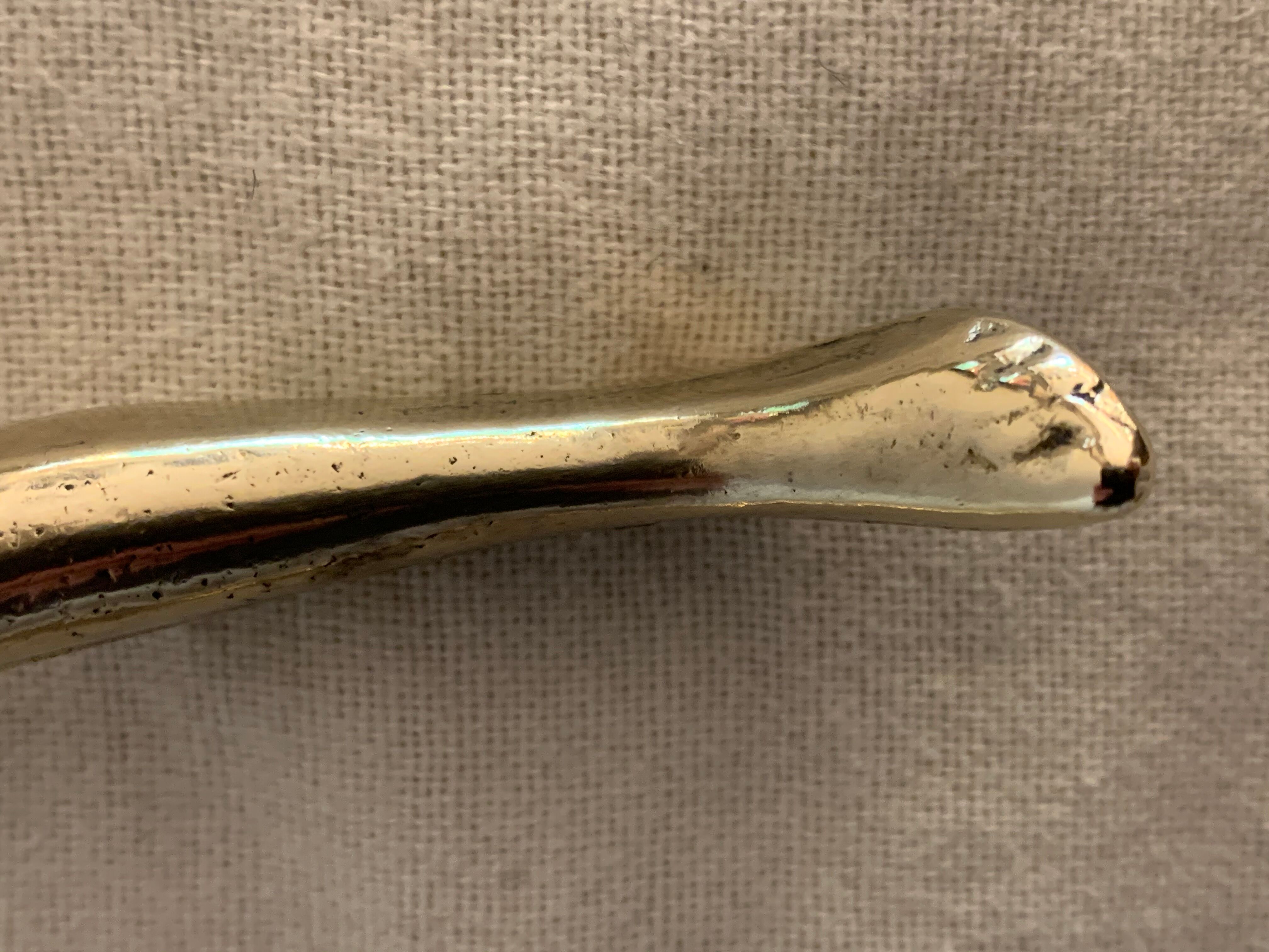 Pair of nutcrackers or anthropomorphic hazelnuts in bronze