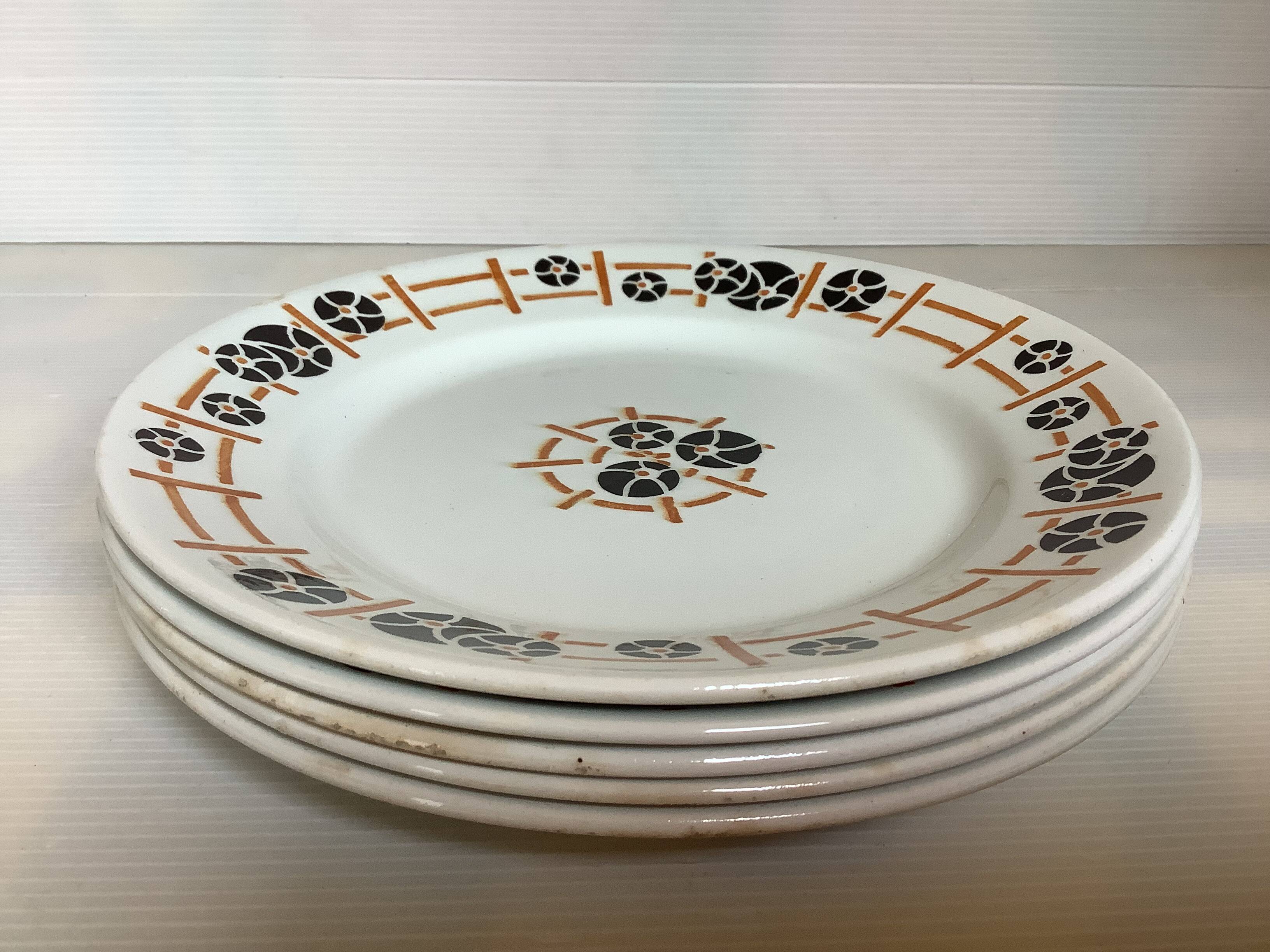 Five old flat earthenware plates from the 1930s, water lilies model