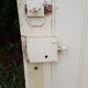 Old door in cream lacquered wood