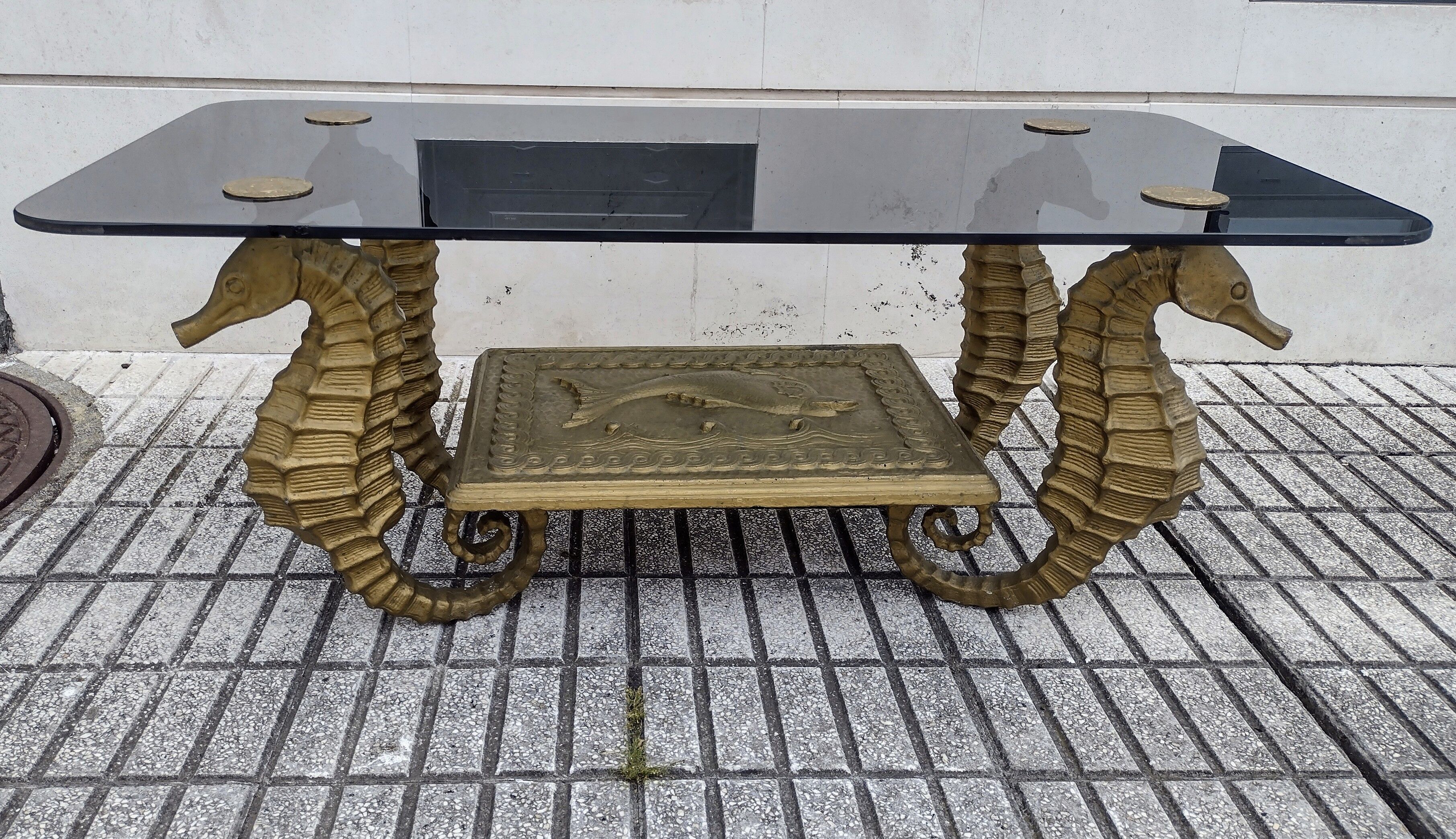Gilt metal Seahorse coffee table with smoked glass