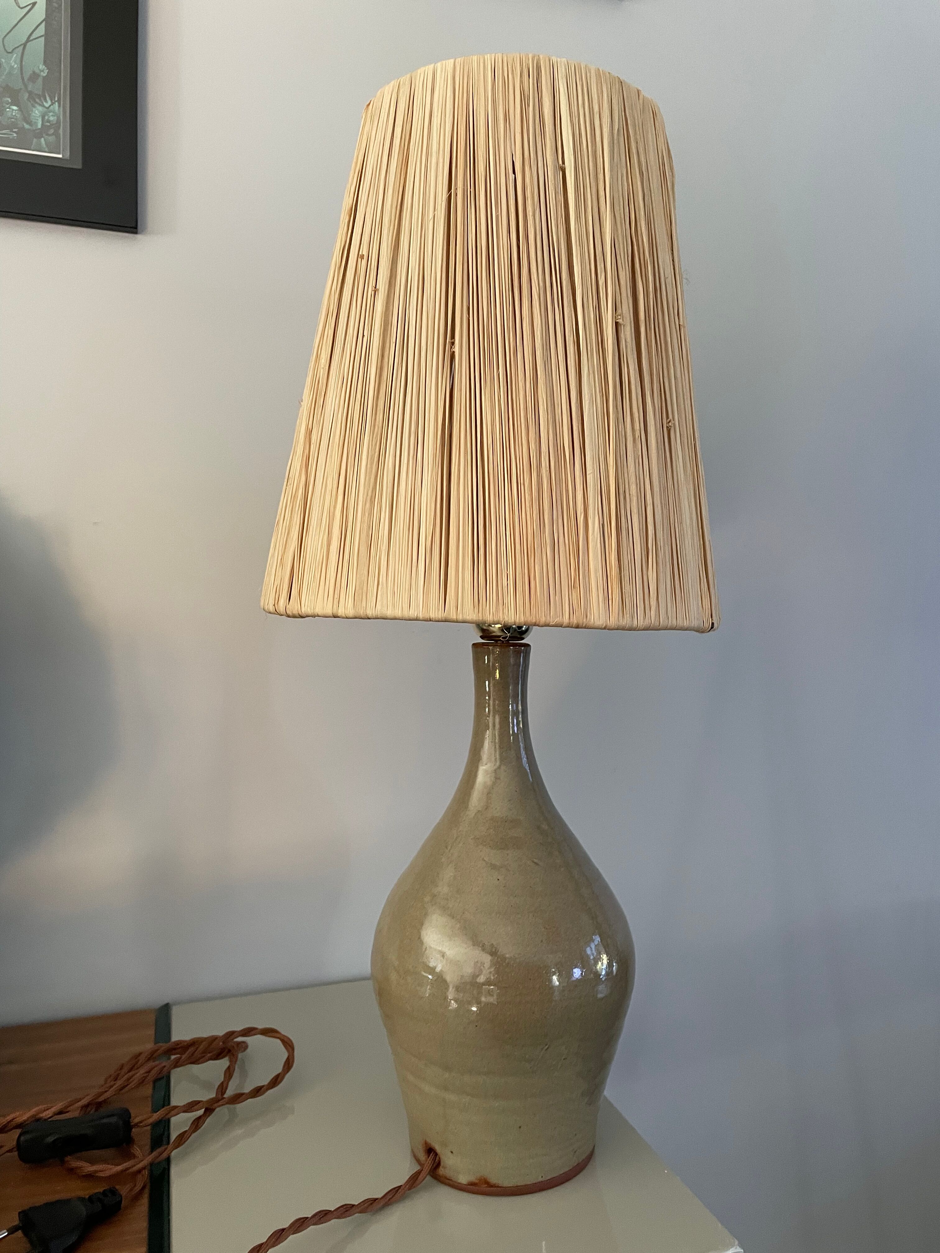 Lamp in stoneware and raffia electrified to nine