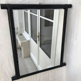 Black lacquered rattan mirror