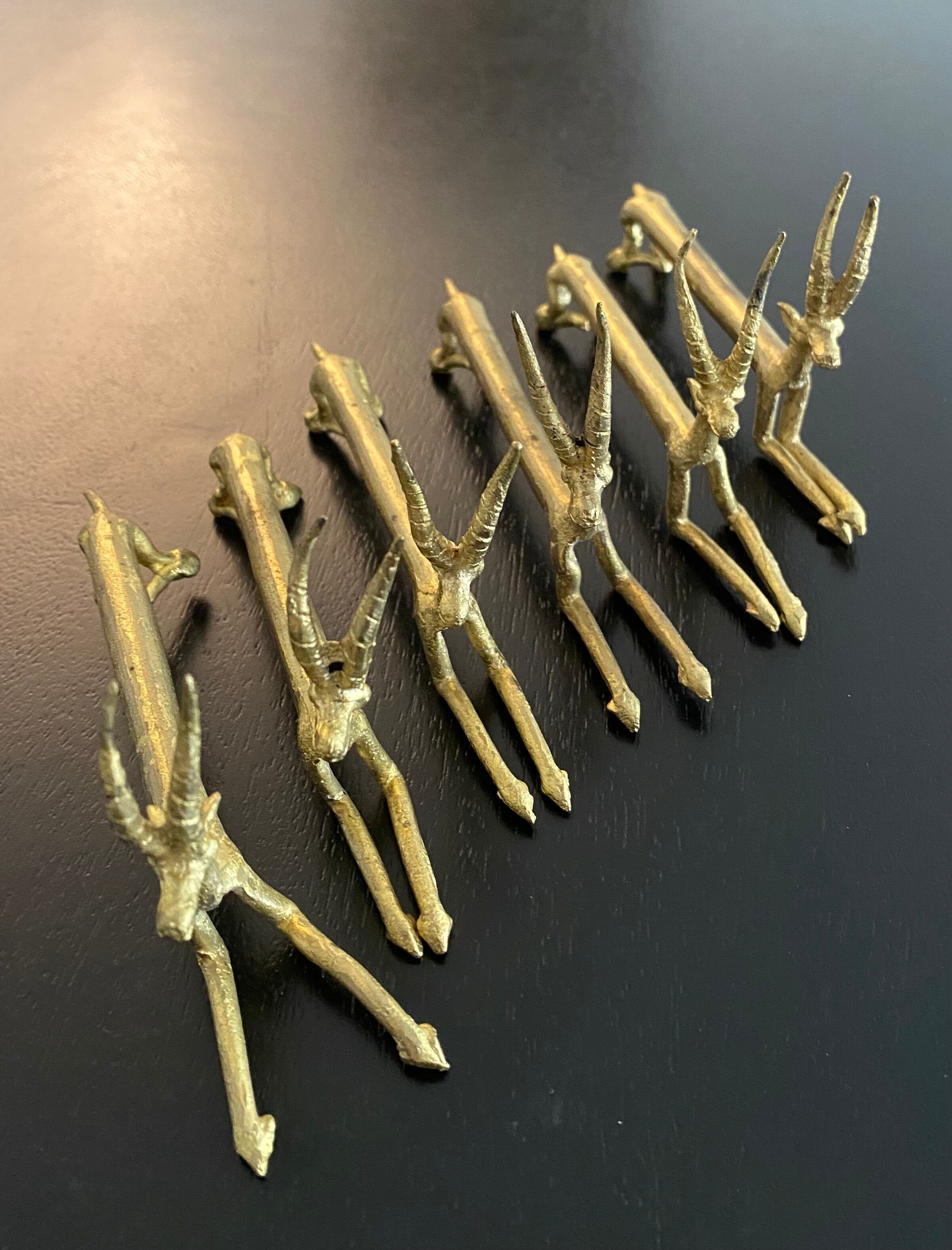 6 porte-couteaux forme antilope en laiton