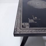 Antique wooden coffee table painted in black and incised with white painted decorations, Ettore Zaccari, Italy c 1910