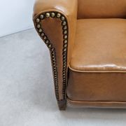 50s club chair in imitation leather and wood