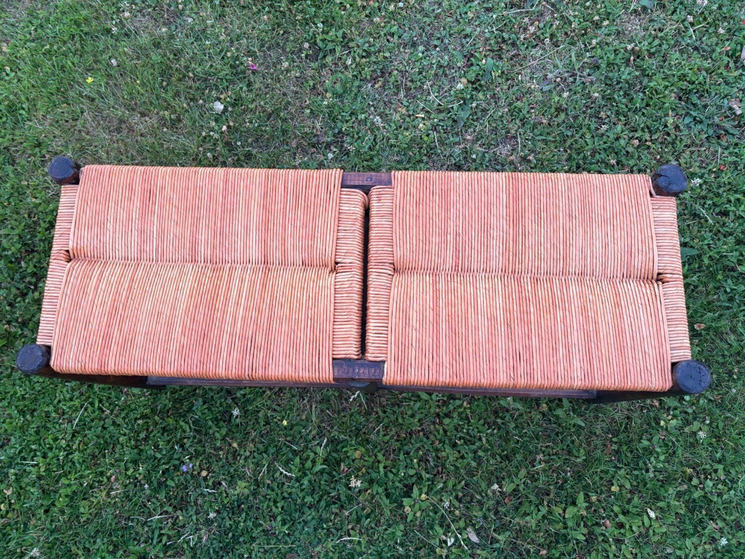 Two-seater straw bench, French rural style, wood and rush, early 20th century.