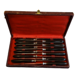 Box of 12 table knives, horn handles