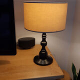 Table lamp in black lacquered turned wood.