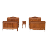 Pair of beds and Art Nouveau bedside in oak, France, circa 1910