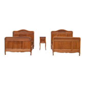 Pair of beds and Art Nouveau bedside in oak, France, circa 1910