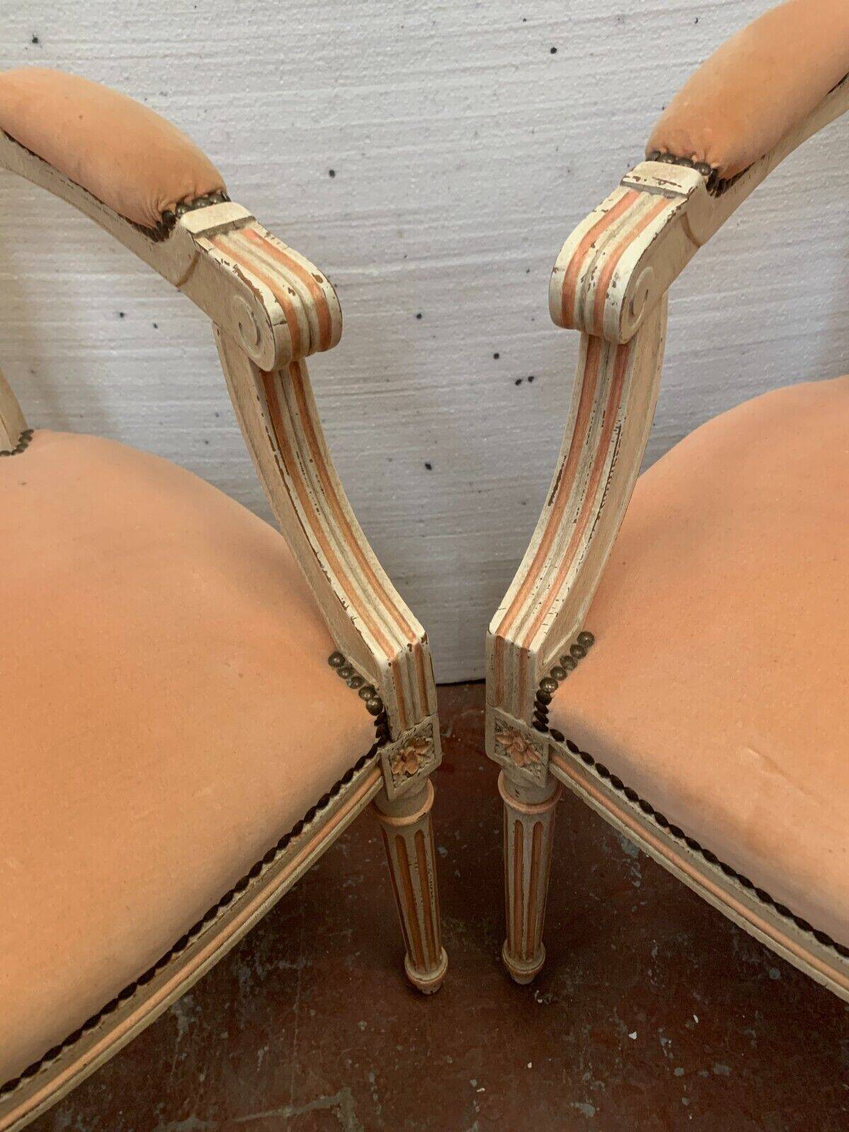 Pair of Louis XVI style armchairs in 20th century patinated beech