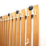 Large vintage coat rack with integrated sideboard, dating from the 1970s