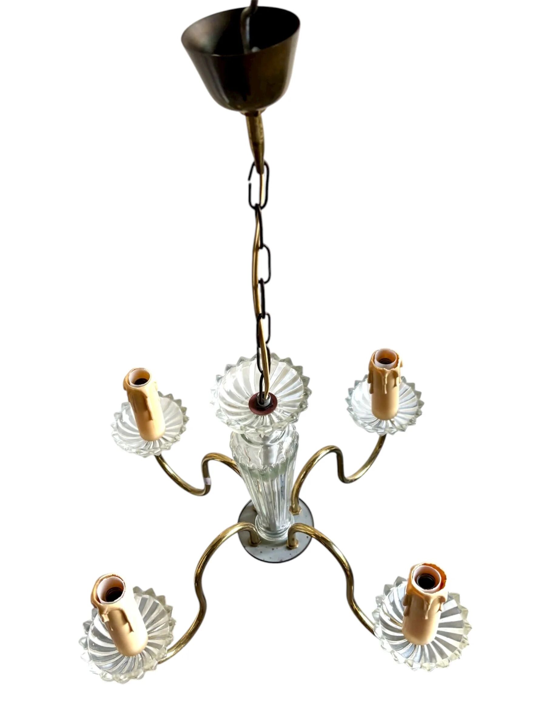 4-light chandelier in glass and gold metal