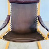 Vintage mid-century scandinavian brown leather lounge chair by ingmar relli