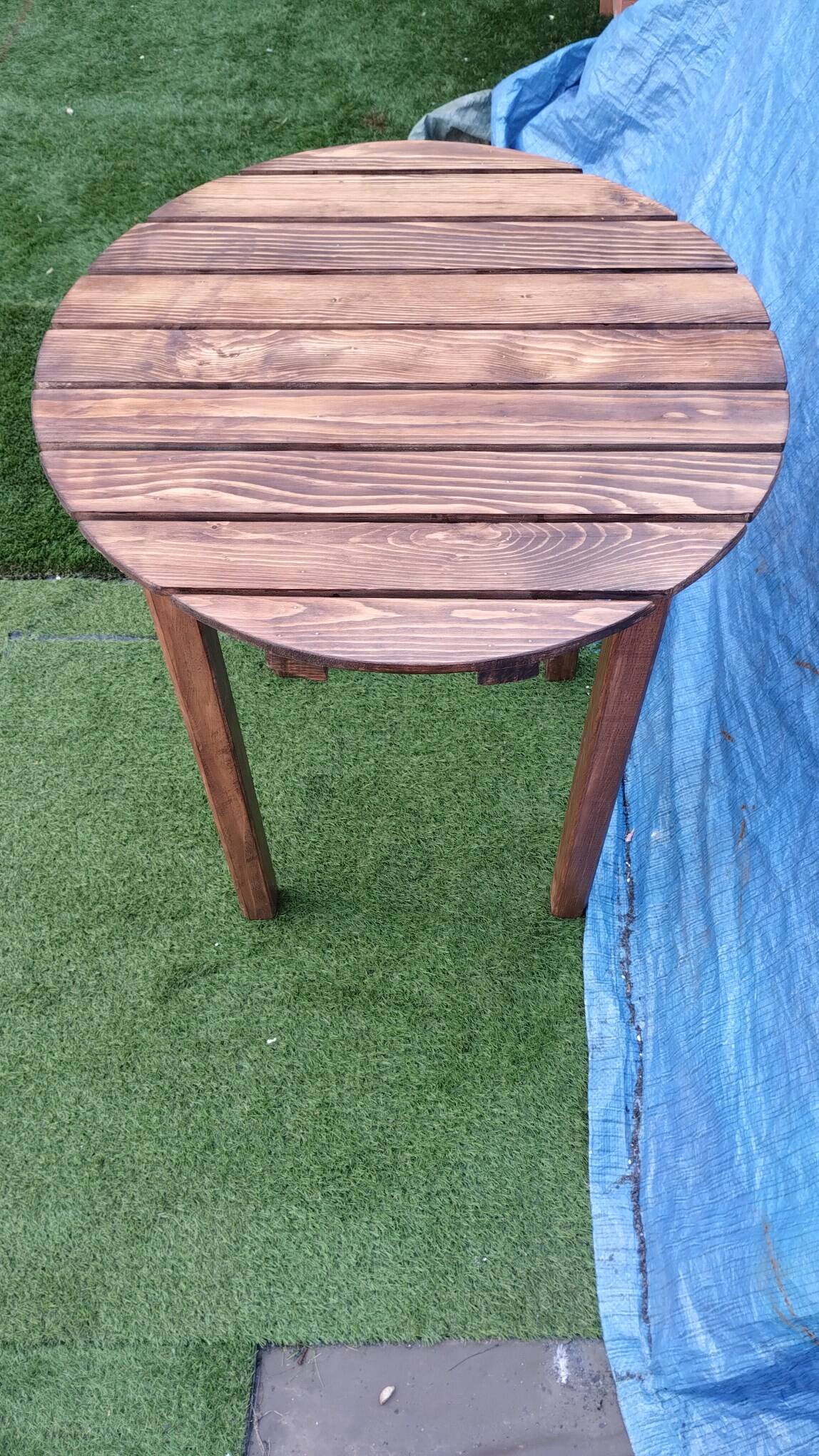 Round solid wood table