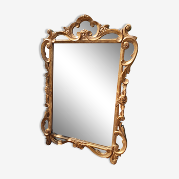 Ancien miroir doré à parcloses de style Régence d'époque 1930.