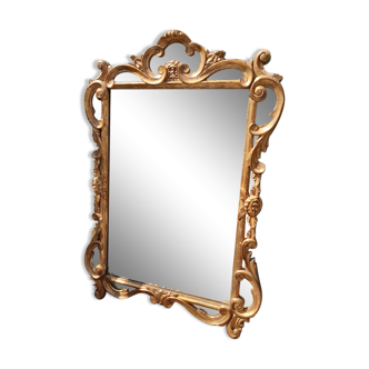 Ancien miroir doré à parcloses de style Régence d'époque 1930.