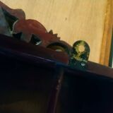 Carved wooden wall shelf for collection or other.